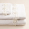 Parure lenzuola morbido cotone effetto lino con fiori di macramè
